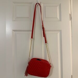 Red crossbody with gold chain